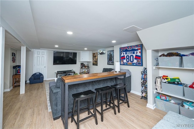 282 N Wrexham Ct, Tonawanda, NY 14150 - indoor dry bar featuring light wood-style flooring and recessed lighting