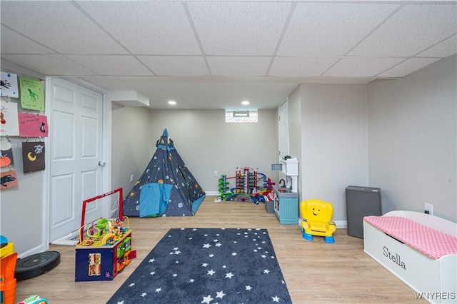 282 N Wrexham Ct, Tonawanda, NY 14150 - rec room featuring wood finished floors and a paneled ceiling