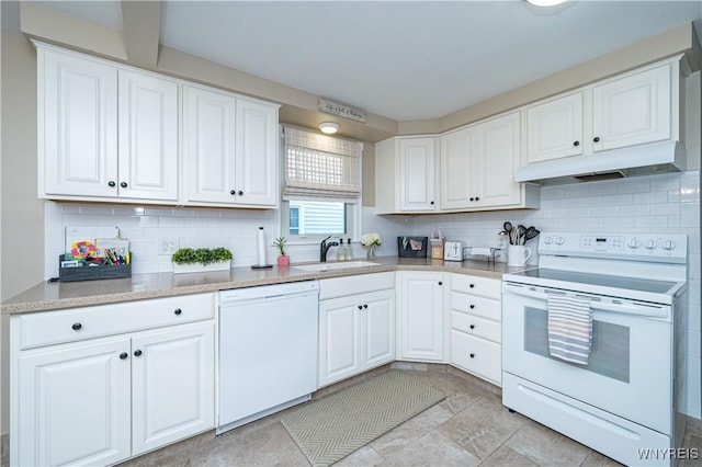 282 N Wrexham Ct, Tonawanda, NY 14150 - kitchen with white appliances, under cabinet range hood, backsplash, and white cabinets