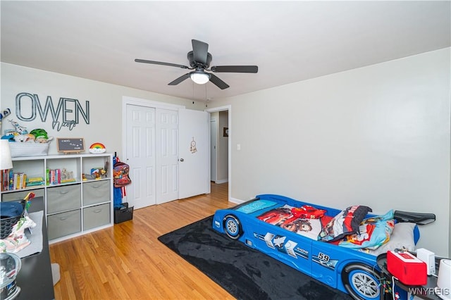 282 N Wrexham Ct, Tonawanda, NY 14150 - bedroom featuring light wood finished floors, a closet, and ceiling fan