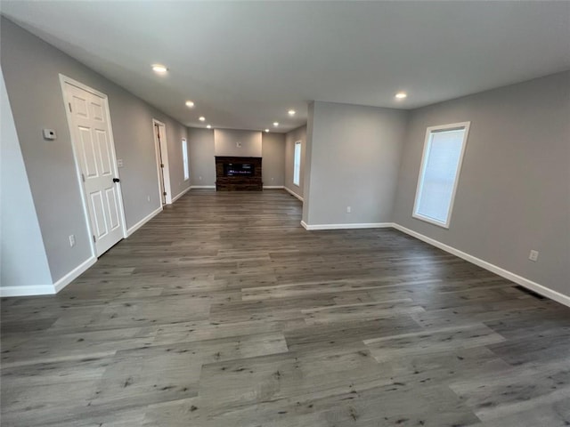 1574 Pine St, Woodhull, NY 14898 - unfurnished living room featuring recessed lighting, a brick fireplace, and wood finished floors