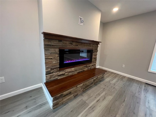 1574 Pine St, Woodhull, NY 14898 - detailed view of wood finished floors, a stone fireplace, and recessed lighting