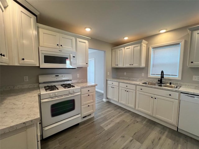 1574 Pine St, Woodhull, NY 14898 - kitchen with white appliances, light countertops, light wood-style floors, white cabinetry, and recessed lighting