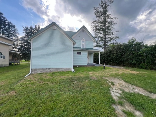 1574 Pine St, Woodhull, NY 14898 - rear view of property featuring a lawn and covered porch