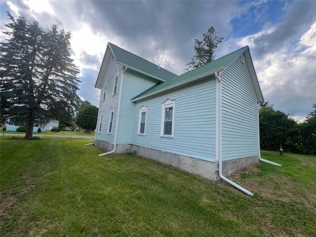 1574 Pine St, Woodhull, NY 14898 - view of home's exterior featuring a yard and a metal roof