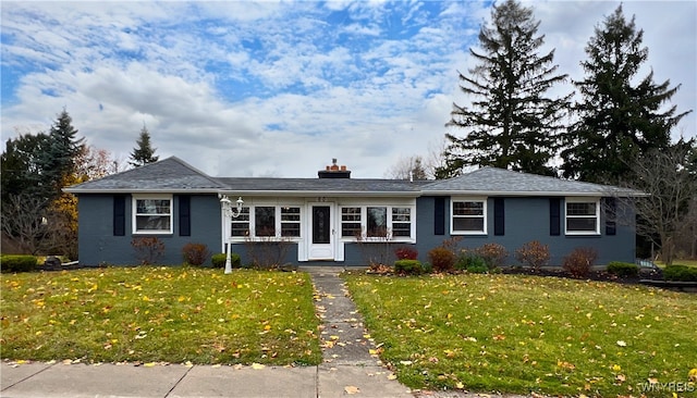 60 Waltham Ave, Lancaster, NY 14086 - view of front of property with a chimney and a front yard