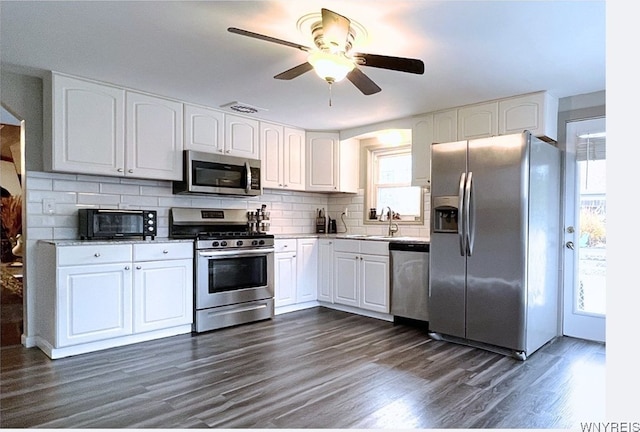 60 Waltham Ave, Lancaster, NY 14086 - kitchen featuring stainless steel appliances, ceiling fan, and white cabinets