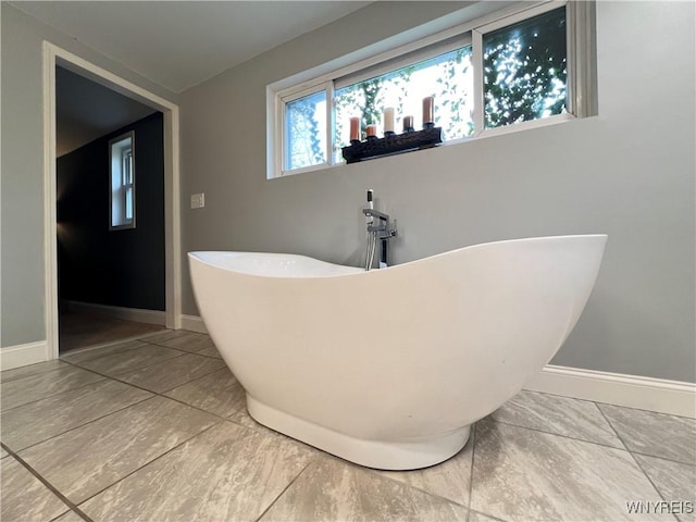 60 Waltham Ave, Lancaster, NY 14086 - bathroom with a freestanding tub