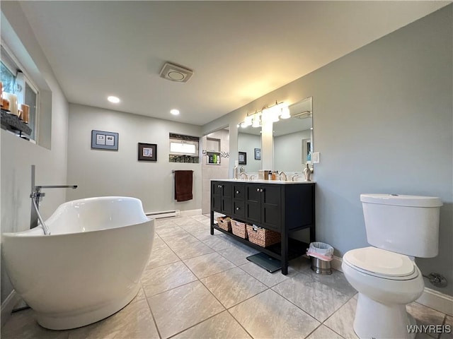 60 Waltham Ave, Lancaster, NY 14086 - full bathroom featuring double vanity, a soaking tub, baseboard heating, recessed lighting, and tile patterned flooring