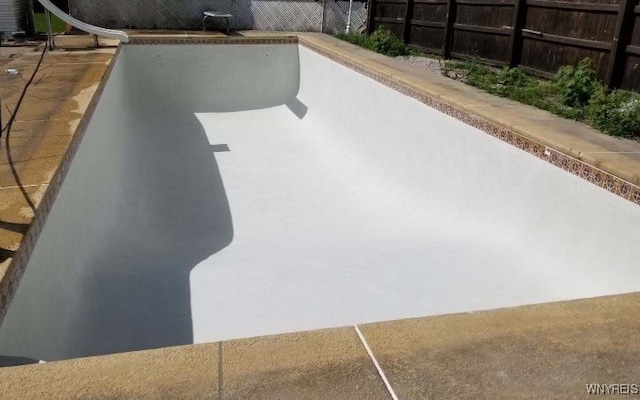 60 Waltham Ave, Lancaster, NY 14086 - view of swimming pool with a water slide