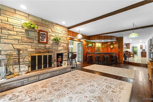 5 Hingham Rd, Utica, NY 13501 - living room with hardwood / wood-style floors, beamed ceiling, a dry bar, recessed lighting, and wooden walls
