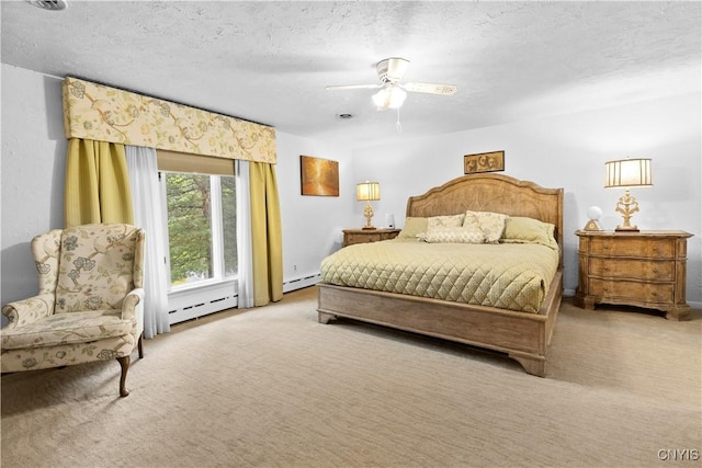 5 Hingham Rd, Utica, NY 13501 - carpeted bedroom with a baseboard radiator, a ceiling fan, and a textured ceiling