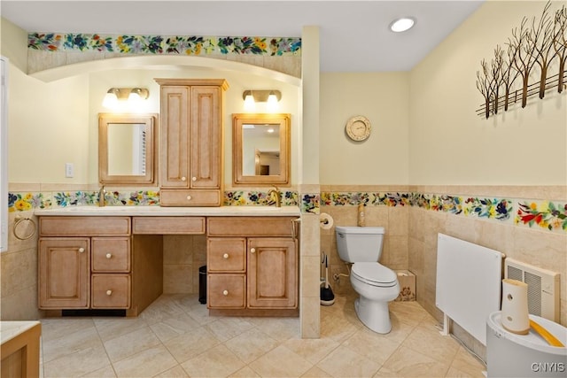 5 Hingham Rd, Utica, NY 13501 - full bathroom with tile walls, vanity, a wainscoted wall, tile patterned floors, and recessed lighting