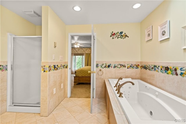 5 Hingham Rd, Utica, NY 13501 - bathroom featuring tile patterned floors, a shower stall, a whirlpool tub, tile walls, and connected bathroom