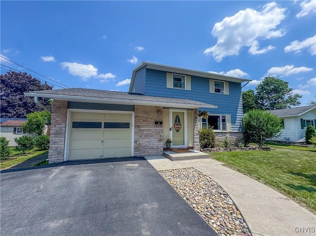8 Harnden St, Auburn, NY 13021 - traditional-style home featuring a garage, a front yard, stone siding, and asphalt driveway