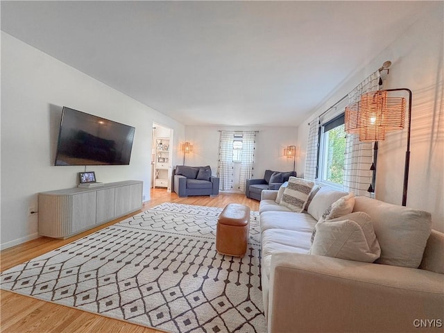 8 Harnden St, Auburn, NY 13021 - living area featuring wood finished floors