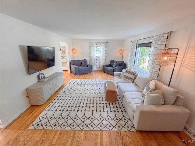 8 Harnden St, Auburn, NY 13021 - living area with wood finished floors