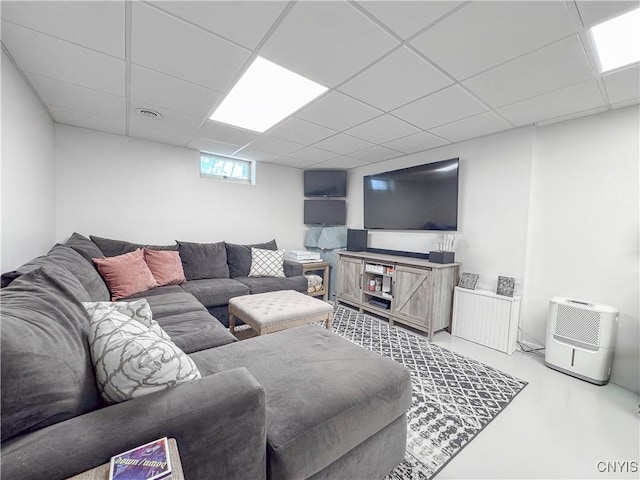 8 Harnden St, Auburn, NY 13021 - living area featuring a drop ceiling and finished concrete flooring
