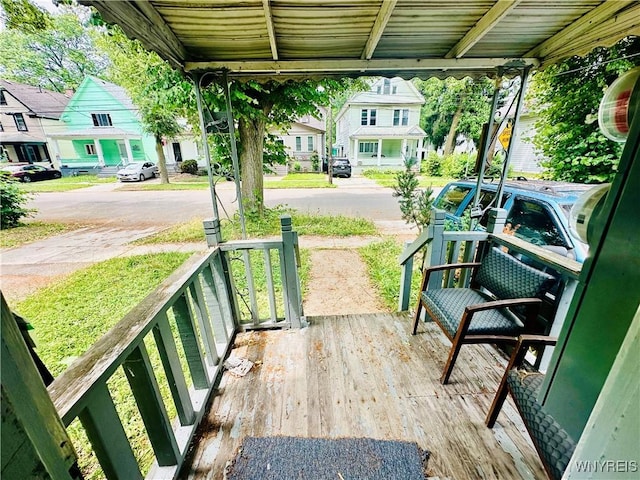 253 Gold St, Buffalo, NY 14206 - wooden porch with a residential view