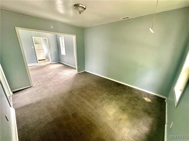 253 Gold St, Buffalo, NY 14206 - empty room with carpet and baseboards