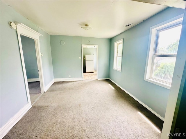 253 Gold St, Buffalo, NY 14206 - carpeted spare room with baseboards