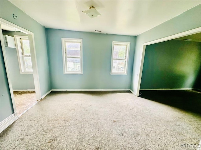 253 Gold St, Buffalo, NY 14206 - carpeted spare room with baseboards