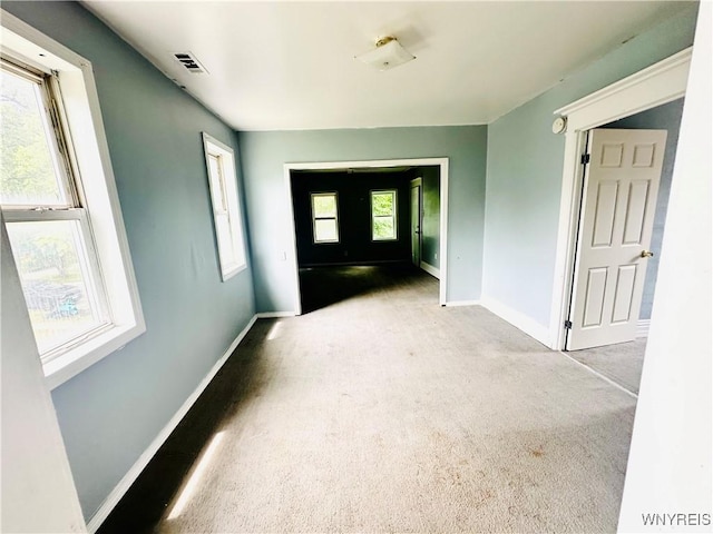 253 Gold St, Buffalo, NY 14206 - carpeted entrance foyer featuring baseboards
