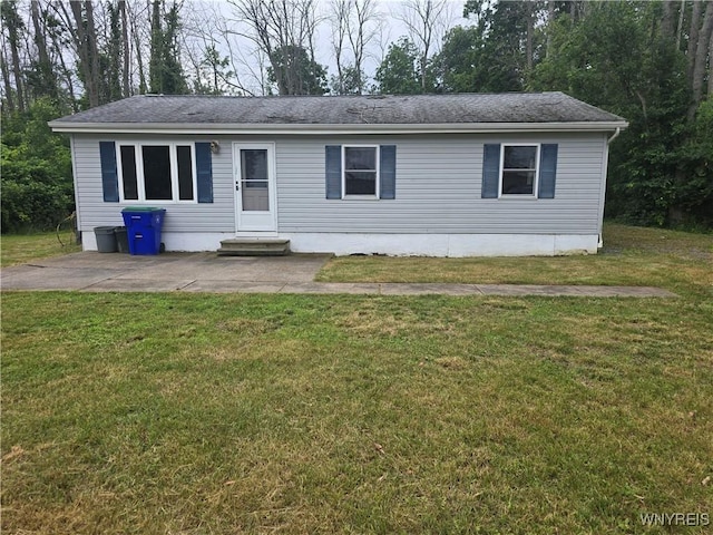 12370 Lake Forest Ln Unit 42, Yates, NY 14098 - view of front of property with a front lawn, a patio, and a shingled roof