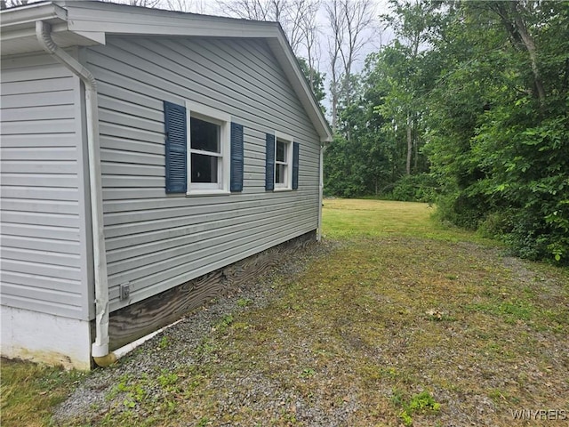 12370 Lake Forest Ln Unit 42, Yates, NY 14098 - view of home's exterior featuring a yard