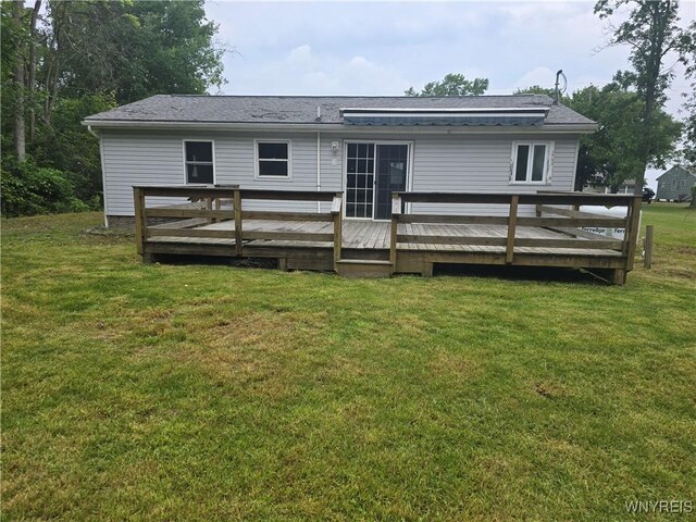 12370 Lake Forest Ln Unit 42, Yates, NY 14098 - back of house with a deck and a lawn