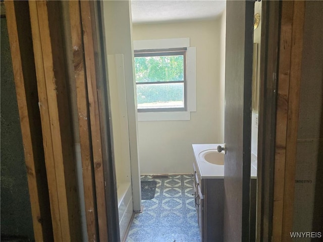 12370 Lake Forest Ln Unit 42, Yates, NY 14098 - bathroom with vanity and a bathtub
