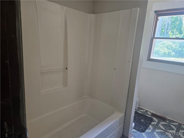 12370 Lake Forest Ln Unit 42, Yates, NY 14098 - full bathroom featuring toilet and shower / tub combination