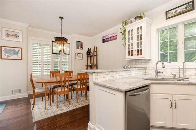 405 Greystone Dr, Horseheads, NY 14845 - kitchen featuring stainless steel dishwasher, dark wood-style floors, white cabinets, backsplash, and crown molding