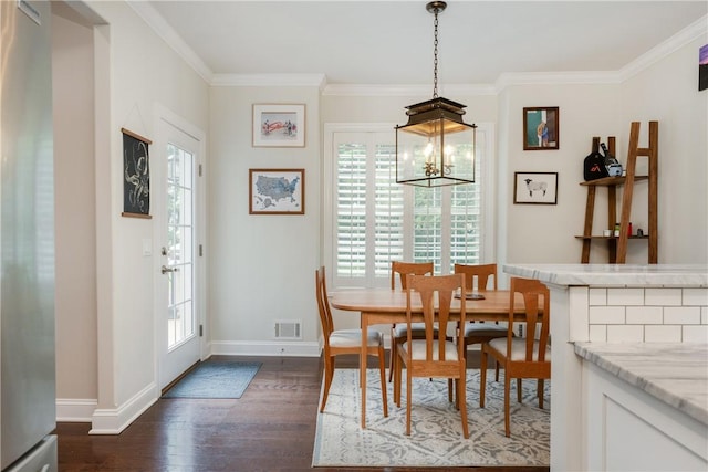 405 Greystone Dr, Horseheads, NY 14845 - dining room featuring ornamental molding, dark wood-type flooring, plenty of natural light, and a chandelier