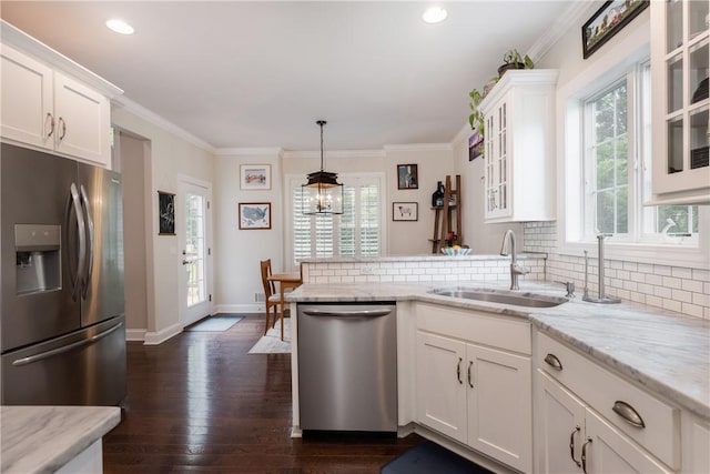 405 Greystone Dr, Horseheads, NY 14845 - kitchen featuring stainless steel appliances, a peninsula, white cabinets, dark wood-type flooring, and ornamental molding