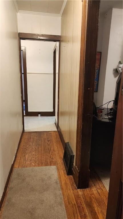 401 Lower Pace Rd, Corning City, NY 14830 - hallway featuring wood finished floors and baseboards