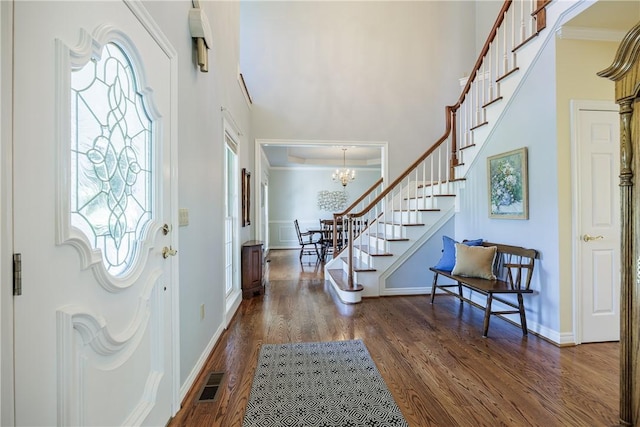 117 Neuchatel Ln, Perinton, NY 14450 - entryway with stairway, wood finished floors, a high ceiling, and a chandelier