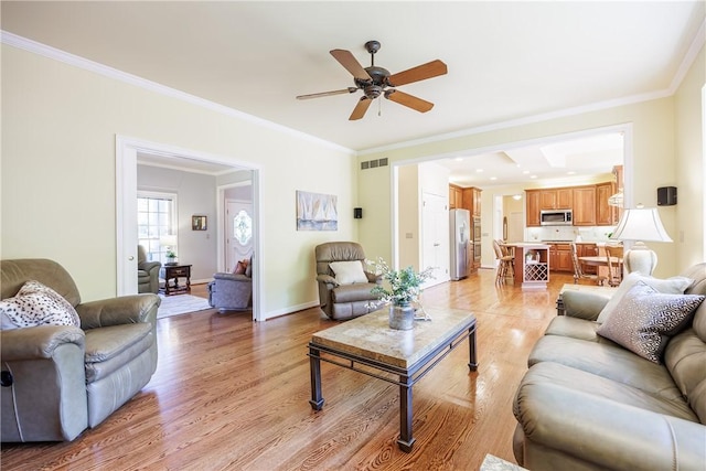 117 Neuchatel Ln, Perinton, NY 14450 - living area with light wood-style flooring, ceiling fan, and ornamental molding