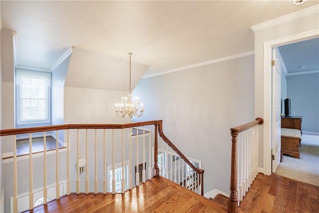 117 Neuchatel Ln, Perinton, NY 14450 - stairway with wood finished floors, a chandelier, and ornamental molding