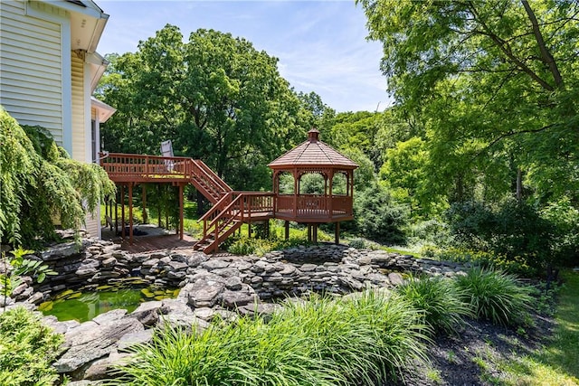 117 Neuchatel Ln, Perinton, NY 14450 - view of yard featuring a gazebo, stairs, and a deck