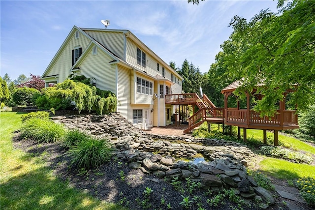 117 Neuchatel Ln, Perinton, NY 14450 - back of property with a deck, stairway, and a gazebo