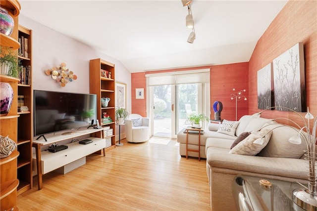 125 Sunset Dr, Brighton, NY 14618 - living area with lofted ceiling and light wood-style flooring