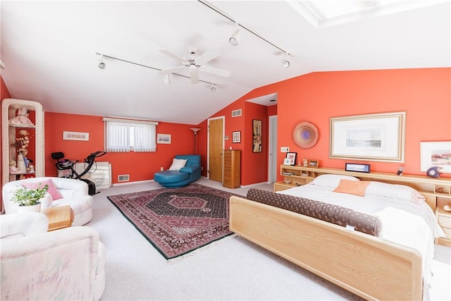 125 Sunset Dr, Brighton, NY 14618 - bedroom featuring rail lighting, lofted ceiling, carpet floors, and a ceiling fan