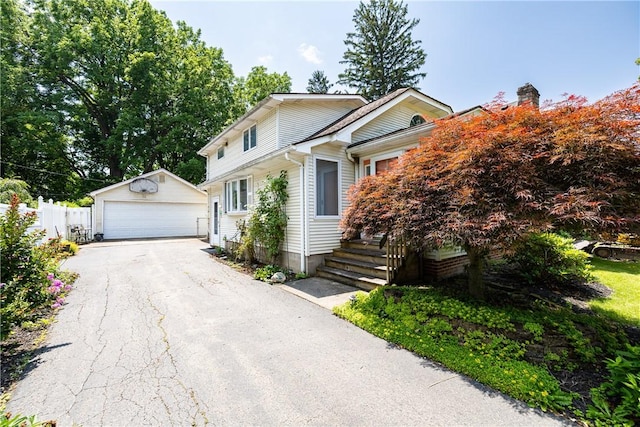 125 Sunset Dr, Brighton, NY 14618 - traditional-style home featuring an outdoor structure and a garage