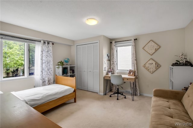 160 Greengage Cir, Amherst, NY 14051 - bedroom featuring a closet, carpet flooring, and a desk