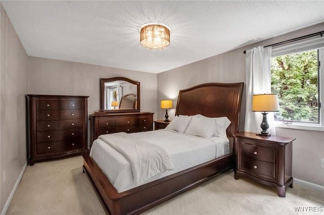 160 Greengage Cir, Amherst, NY 14051 - bedroom featuring light carpet and a chandelier