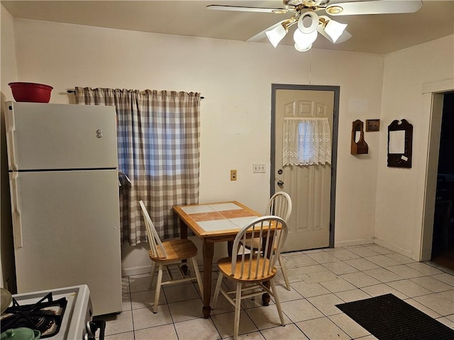 178 Campbell Park, Rochester, NY 14606 - dining room featuring ceiling fan and light tile patterned floors