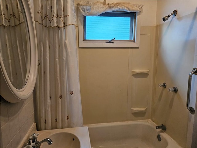 178 Campbell Park, Rochester, NY 14606 - bathroom featuring shower / bath combo with shower curtain and a sink