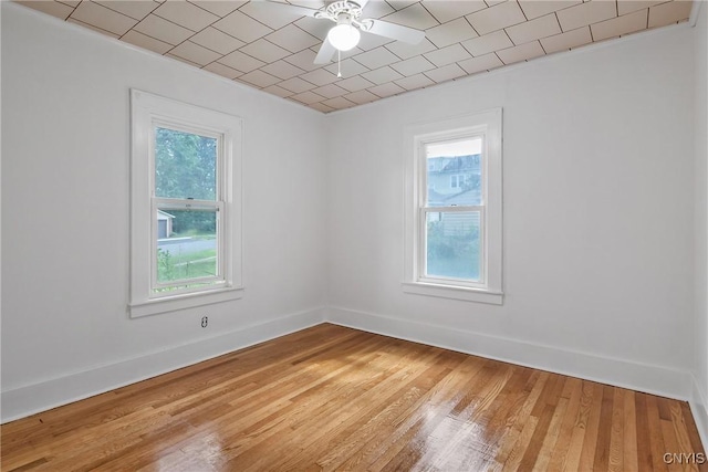 201 Mosley Dr, Syracuse, NY 13206 - empty room with light wood finished floors and ceiling fan