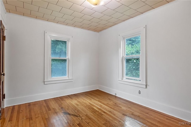 201 Mosley Dr, Syracuse, NY 13206 - spare room featuring hardwood / wood-style floors and crown molding